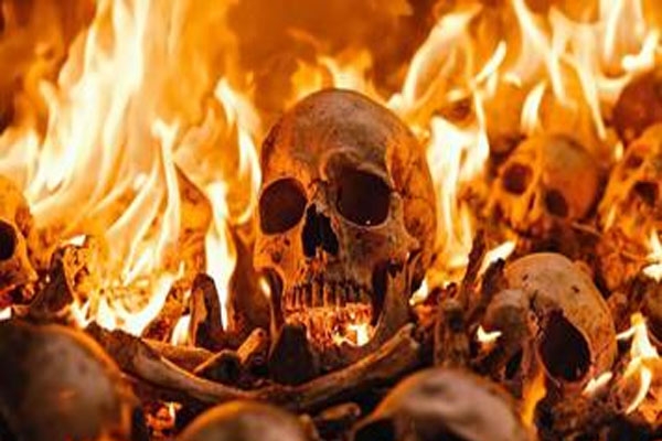 Skulls near a burning pyre