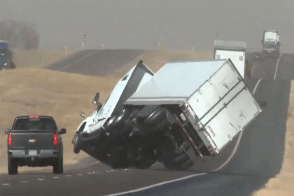 truck-overturns-on-road-texas