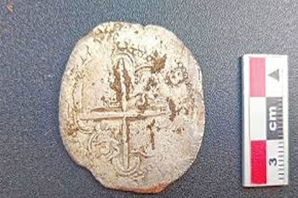 400-year-old Spanish silver coin,
