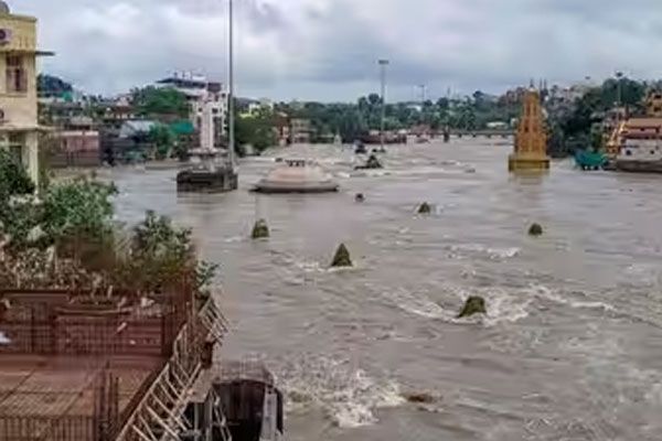 400 families shifted as floodwaters submerge homes and shops in chandori nashik