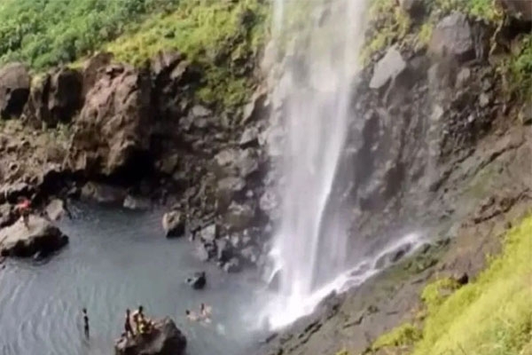 heavy rains in maharashtra: 2 youths swept away at pandavkada waterfall, landslide in pune and flood alert in mumbai region