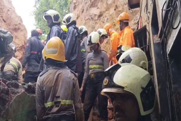 mumbai rain ghatkopar landslide buries homes, 2 dead, several feared trapped