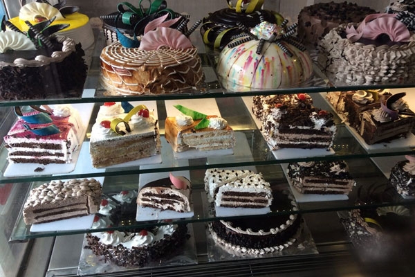 nalasopara cake horror dead lizard allegedly found in birthday cake, several hospitalized