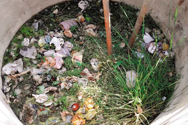 dumping garbage into the well